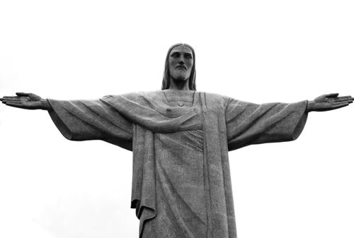 Free Iconic Christ the Redeemer statue with open arms in Rio de Janeiro, Brazil. Stock Photo