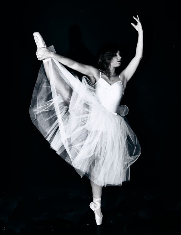 Ballerina in White Dress Dancing