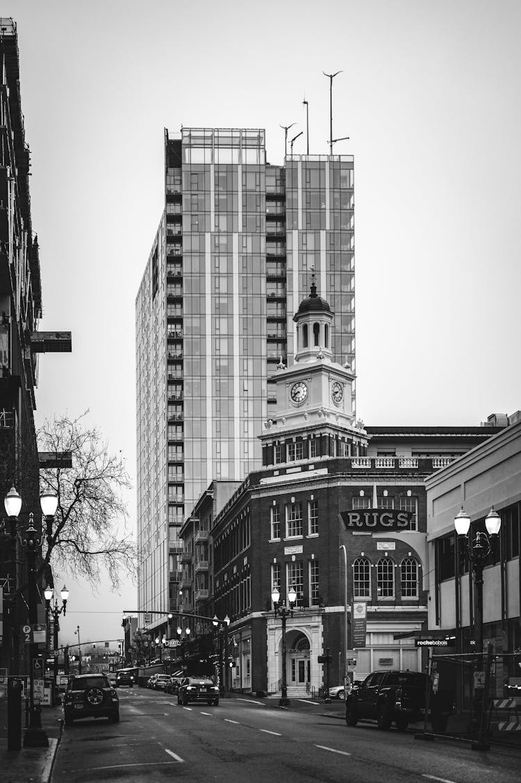 Modern Architecture Of Apartment High-rise And Old 19th Century Buildings Along Street