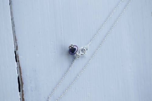 Silver Necklace with Purple Bead Pendant 