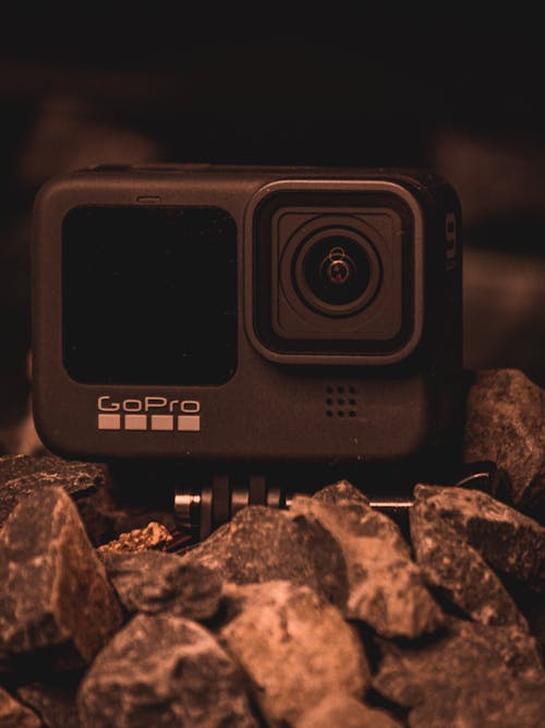 Free Black Gopro Camera on Gray Rock Stock Photo