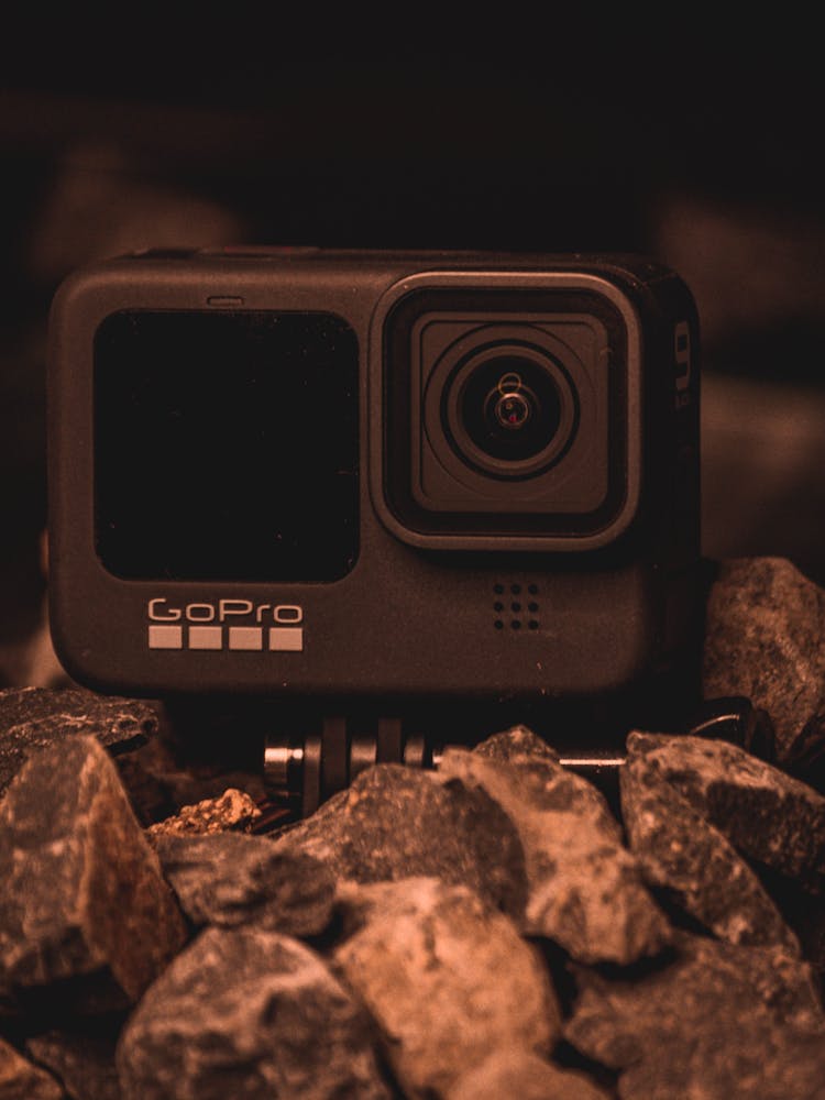 Black Gopro Camera On Gray Rock