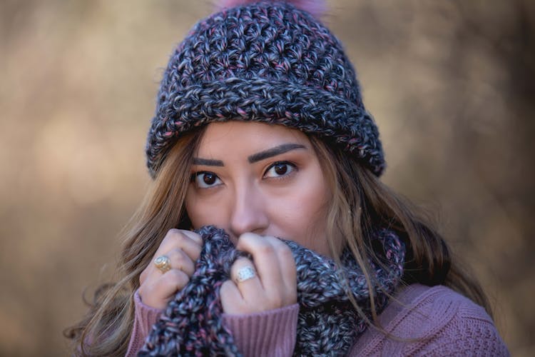 Woman With Beautiful Eyes In Crochet Beanie And Scarf