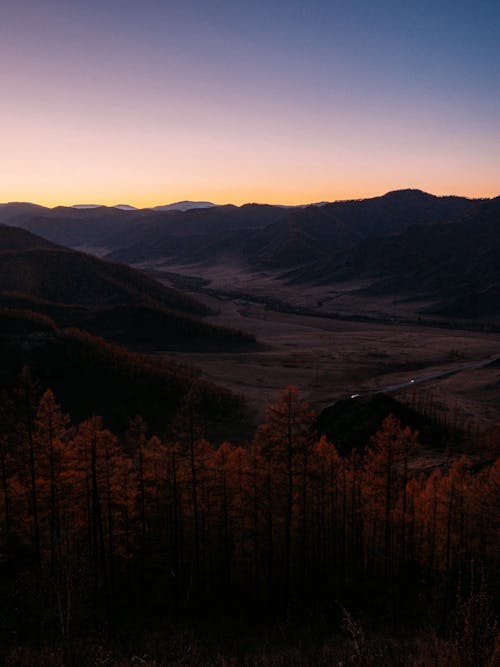 Aerial Photography of Mountains and Trees during Sunset