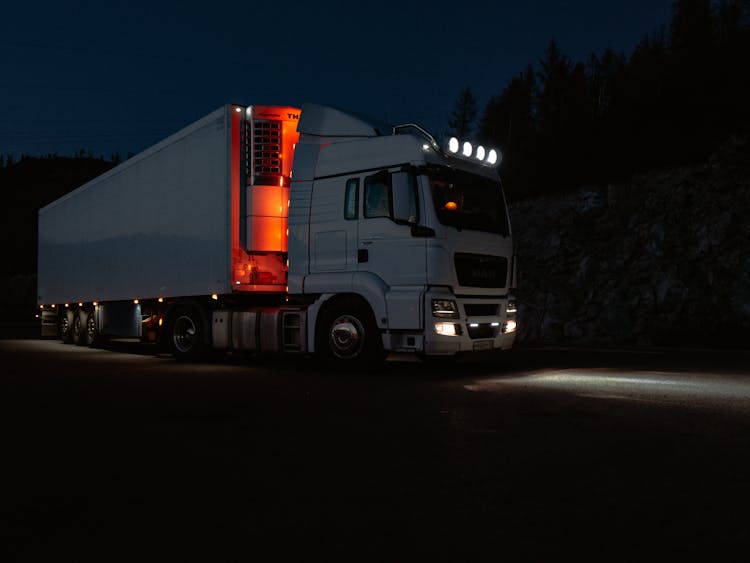 Photo Of A White Truck With Lights