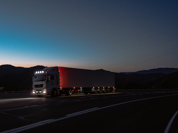 Photo Of A Truck With White Lights