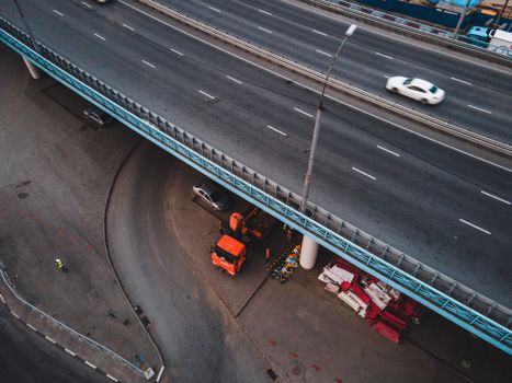 Overhead drone shot of a busy urban highway intersection in Novosibirsk, Russia.