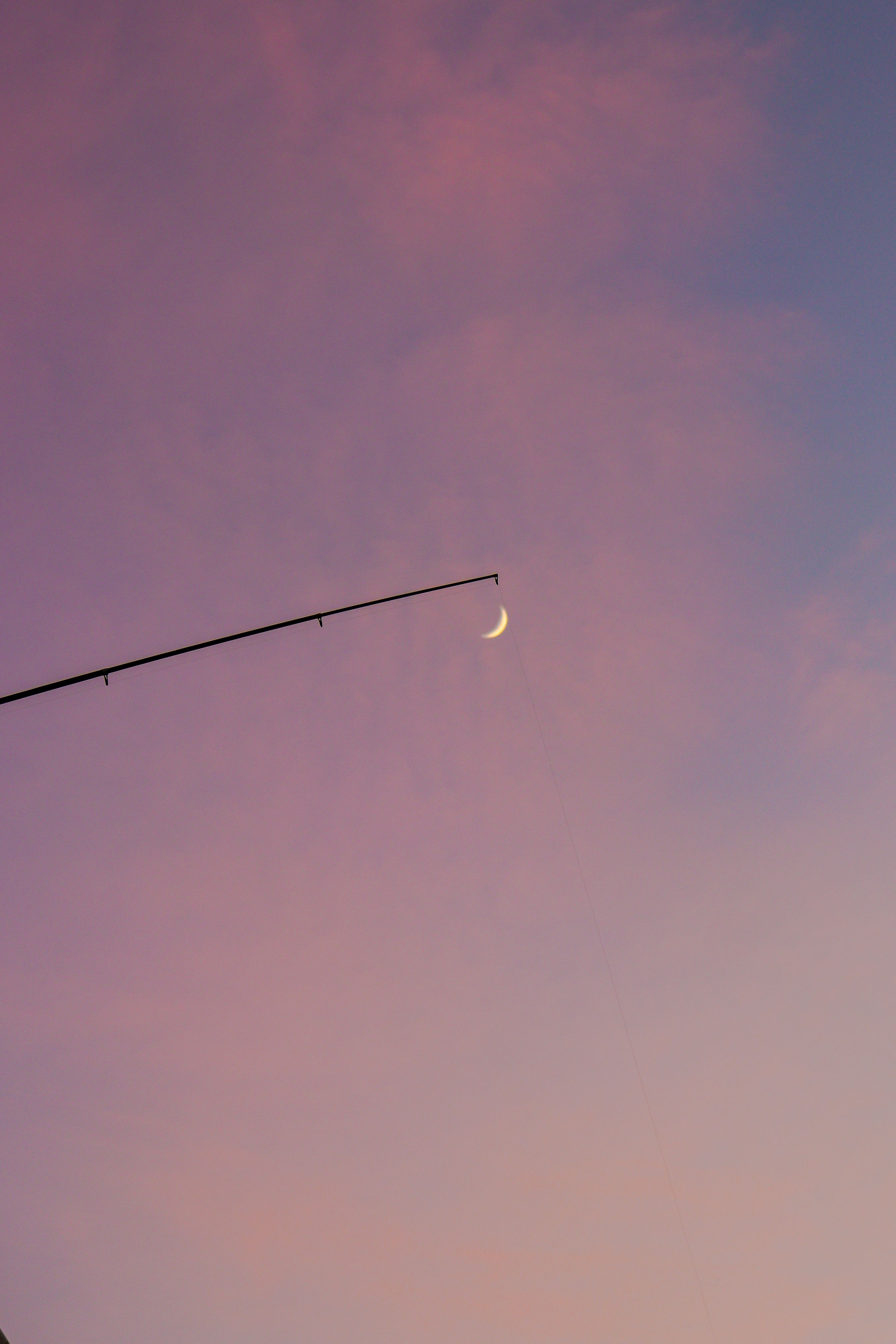 A crescent moon is seen in the sky · Free Stock Photo