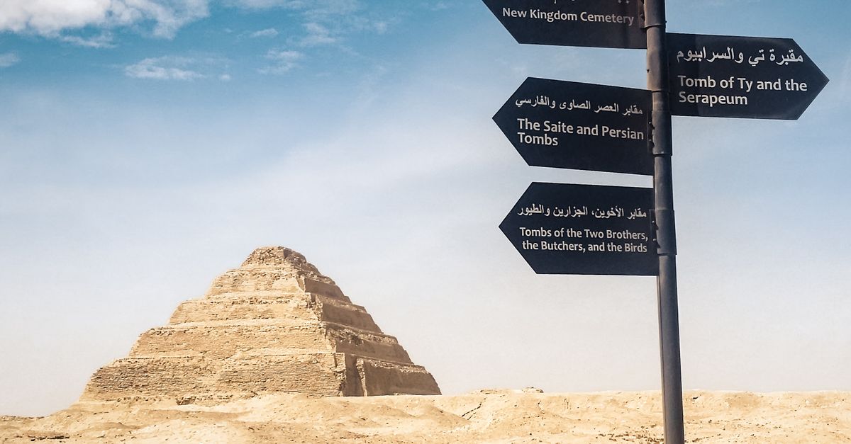 Pyramid Traffic Signs Directional Signs Near a Pyramid · Free Stock Photo