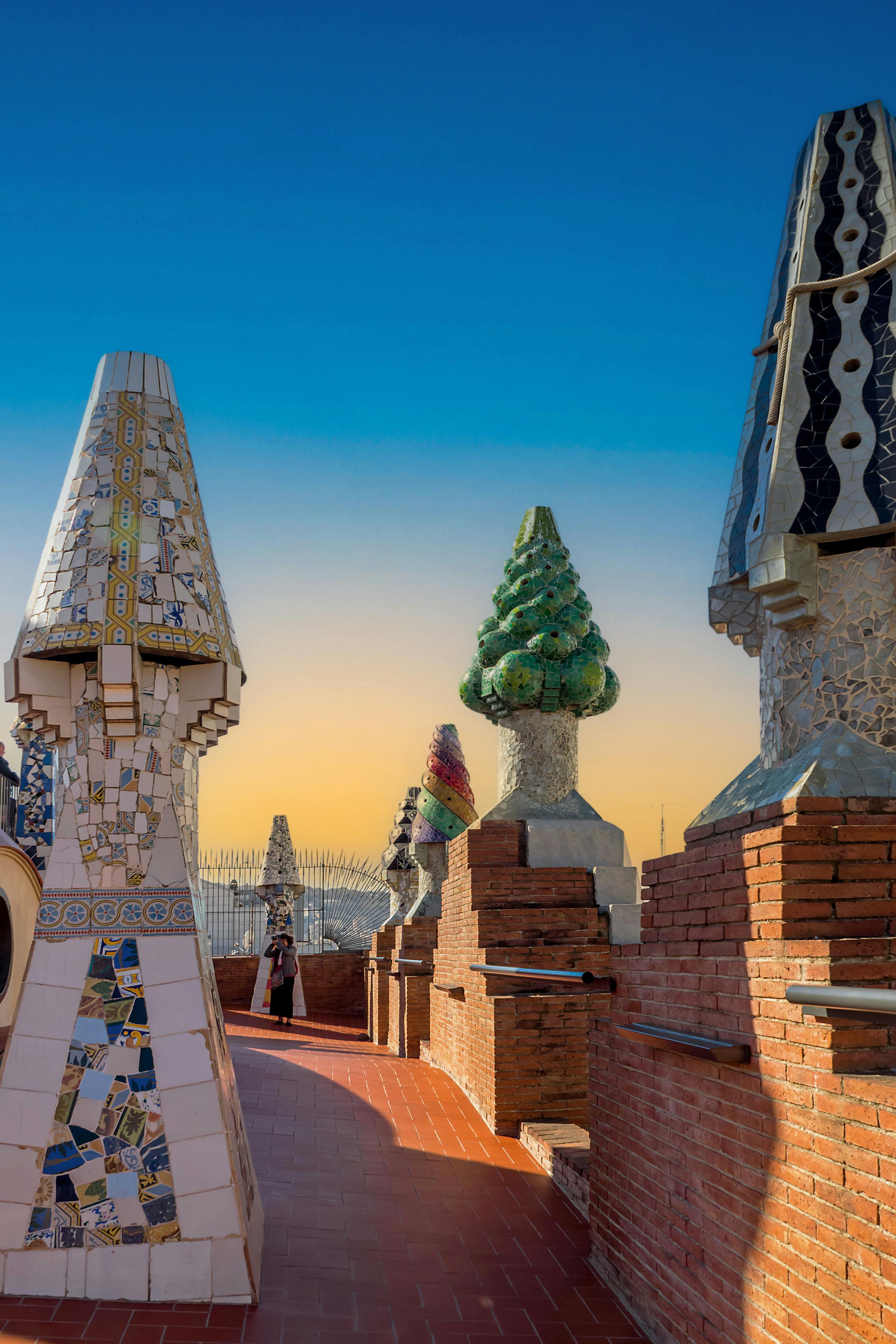 mosaic chimneys at the palace guell roof in barcelona spain