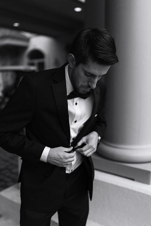 Black and White Portrait of Man in Full Suit