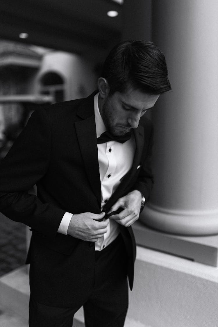 Black And White Portrait Of Man In Full Suit