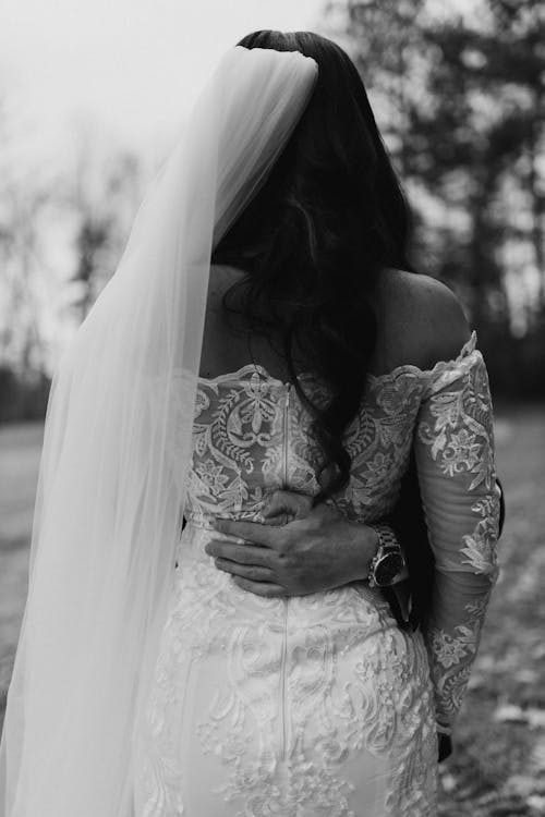 Back View of a Woman Wearing a Wedding Dress 
