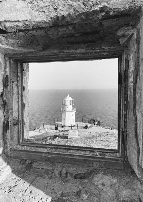 Fotos de stock gratuitas de blanco y negro, cuerpo de agua, faro