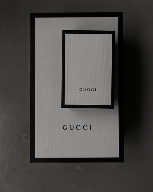 Free Minimalistic top view of Gucci boxes, perfect for luxury product presentations. Stock Photo