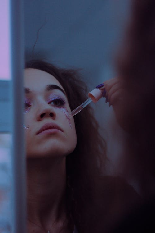 Woman Painting Face