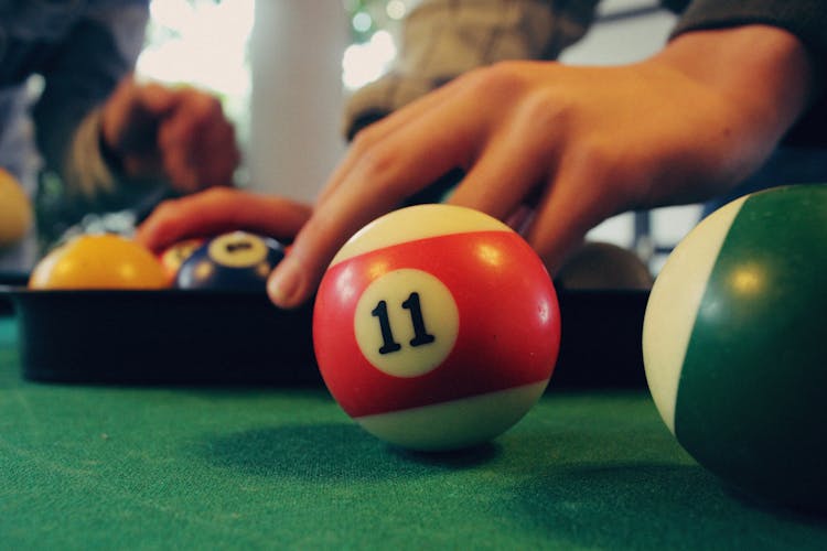 A Person Racking The Billiard Balls 