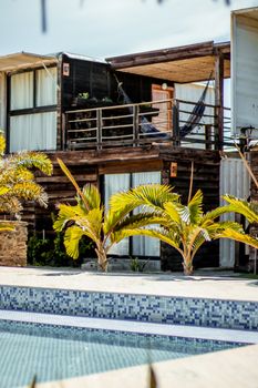 Stylish tropical retreat in Adicora, Venezuela with palms and poolside charm.