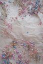 Colorful Dried Flowers Lying on White Paper
