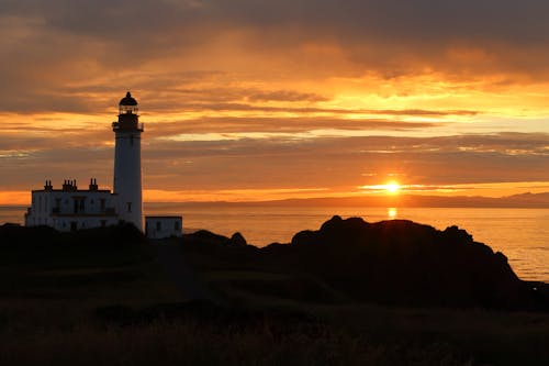 Fotos de stock gratuitas de amanecer, anochecer, faro