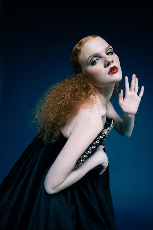 Redhead Woman Wearing Black Dress