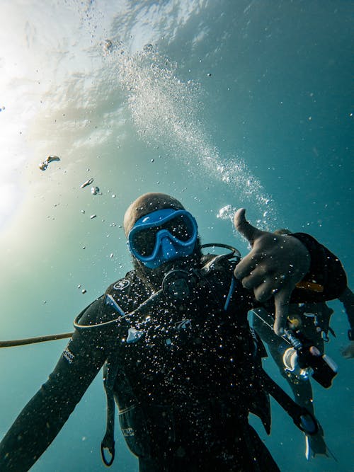 Free OK Signal Made Underwater by Scuba Diver Stock Photo