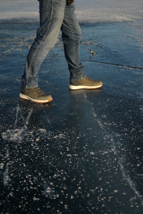 Man Walking on Frozen Ice