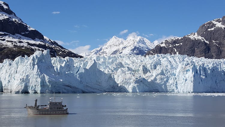 Boat Near A Glacier In Alaska