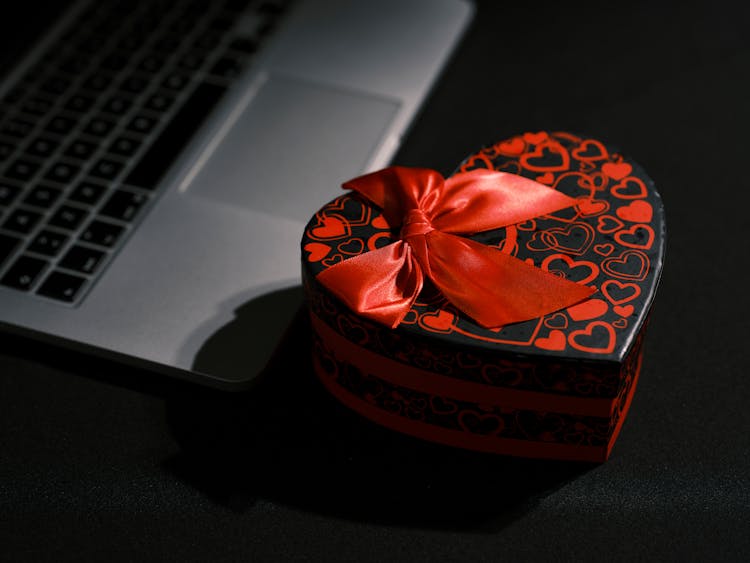 A Heart Shape Box With Ribbon