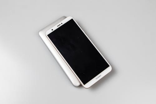 White Android Smartphone on White Table