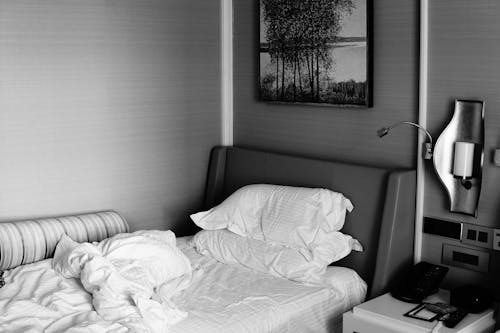 Free Grayscale Photo of Bed With Pillows Stock Photo