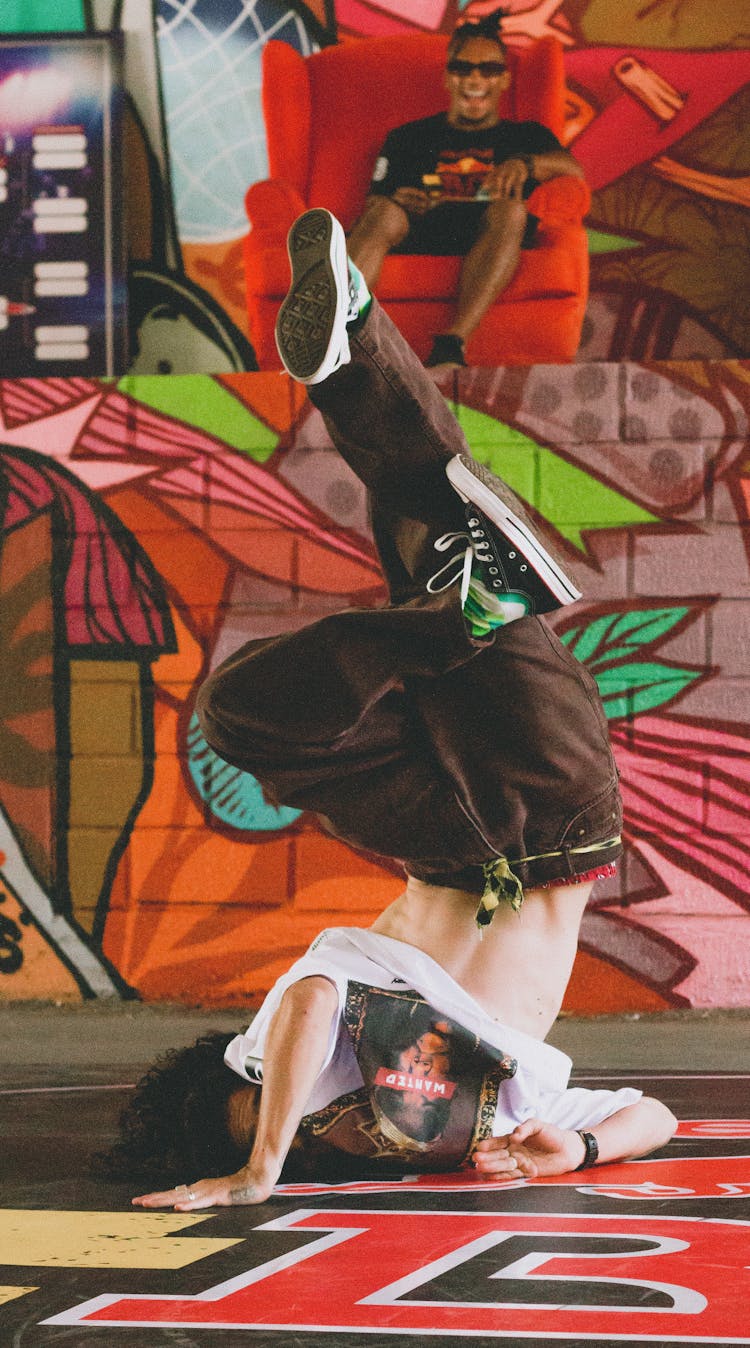 Dancer Doing A Head Stand