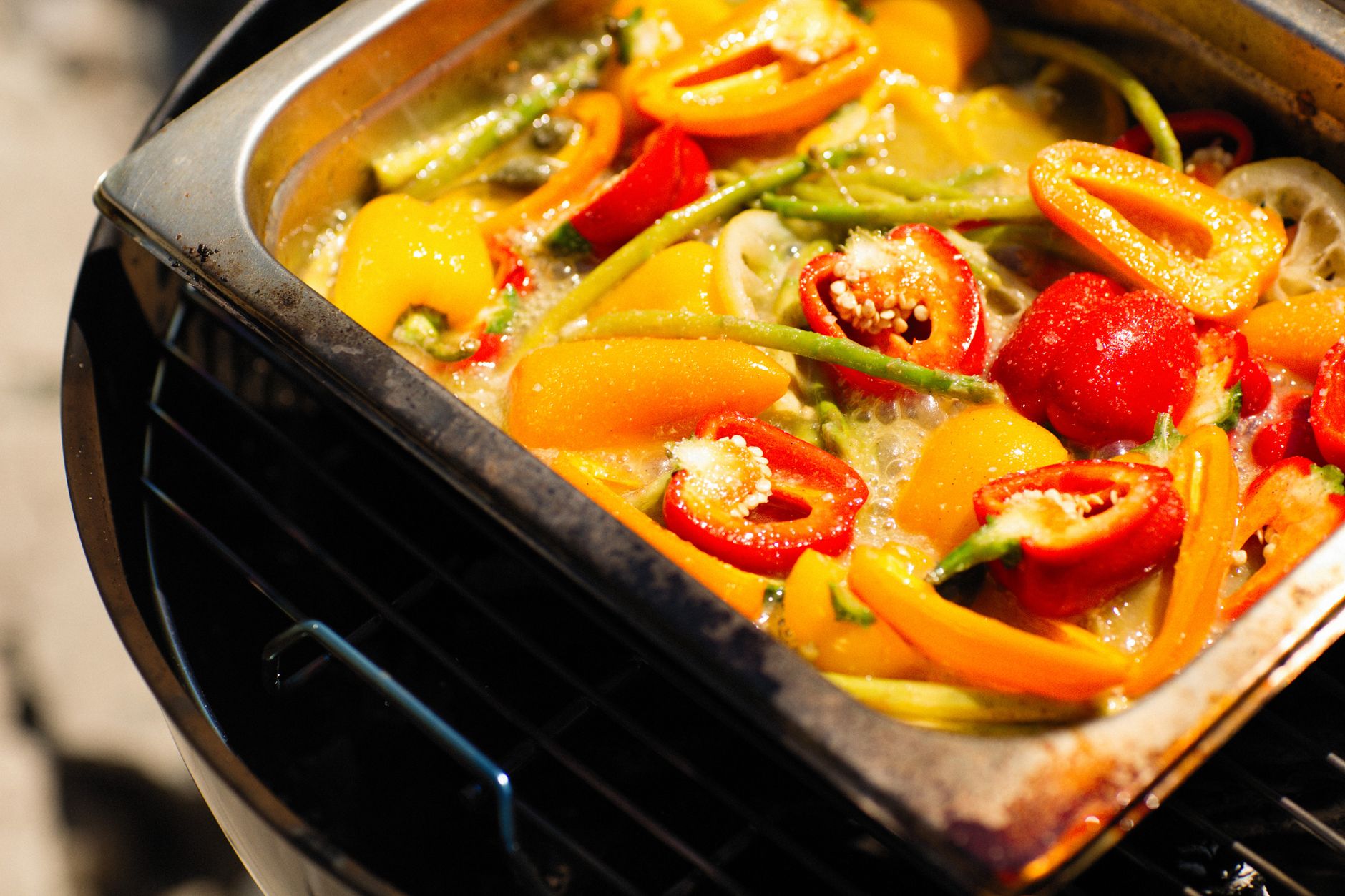 Platter of colorful grilled vegetables with herbs