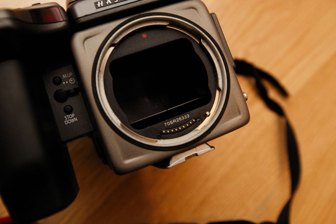 Camera Without Focus Close-up of a Camera Body Without a Lens · Free Stock Photo