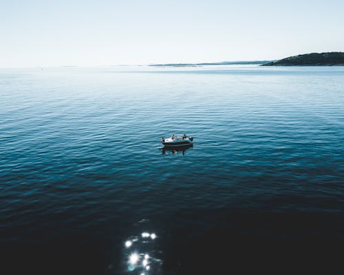Free Two Person Riding Boat Stock Photo
