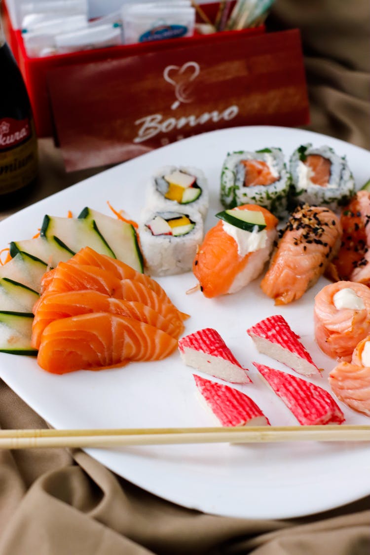 Elegant Presentation Of Delicious Crab And Salmon Sushi