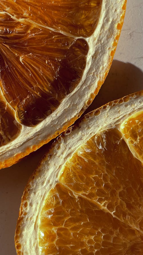 Close-Up Shot of Sliced Orange Fruits