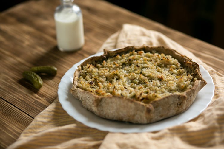 Rustic Savory Pie On White Plate