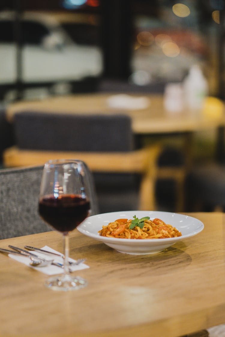 Pasta And A Glass Of Red Wine 