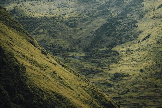 Green and Black Mountains Under Blue Sky