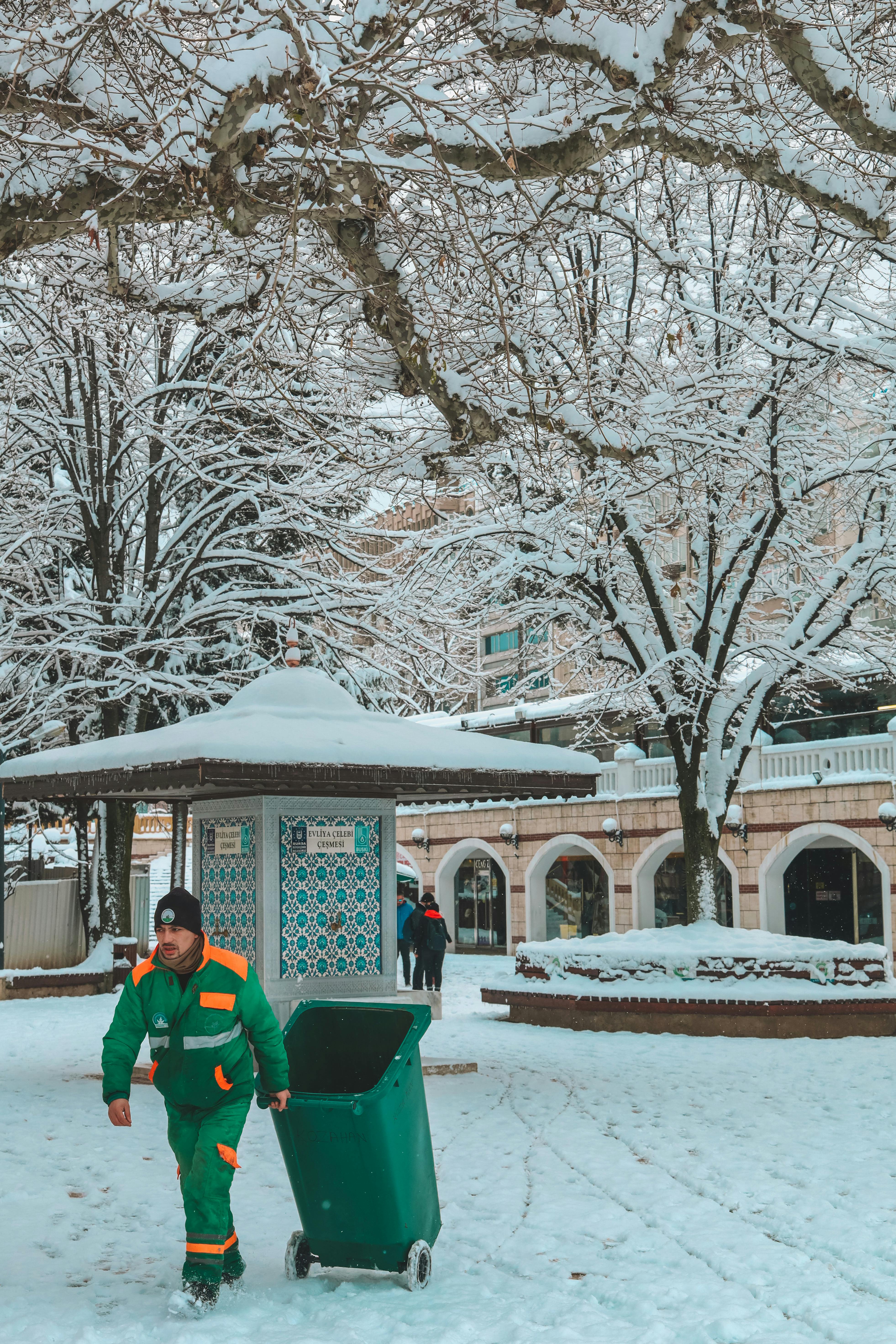 janitor working on snow street