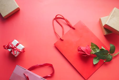 Red Paper Bag on Pink Table