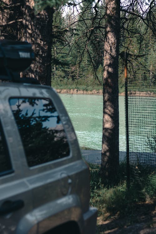 A Car Parked near a Body of Water 