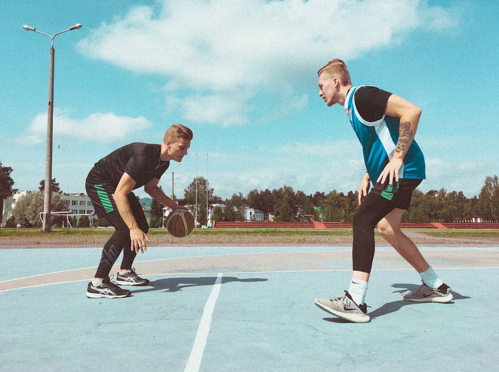 Men Playing Basketball