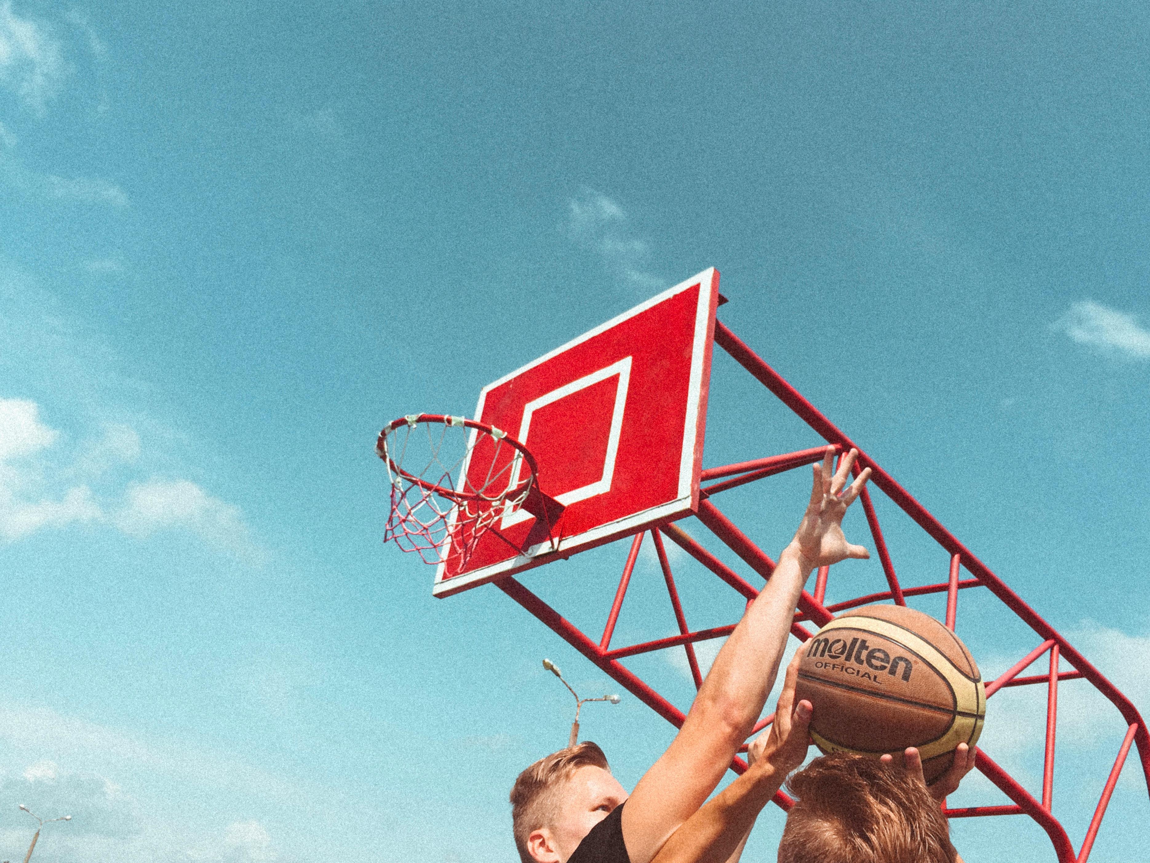 men playing basketball