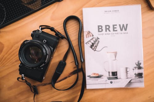 Camera Beside a Book