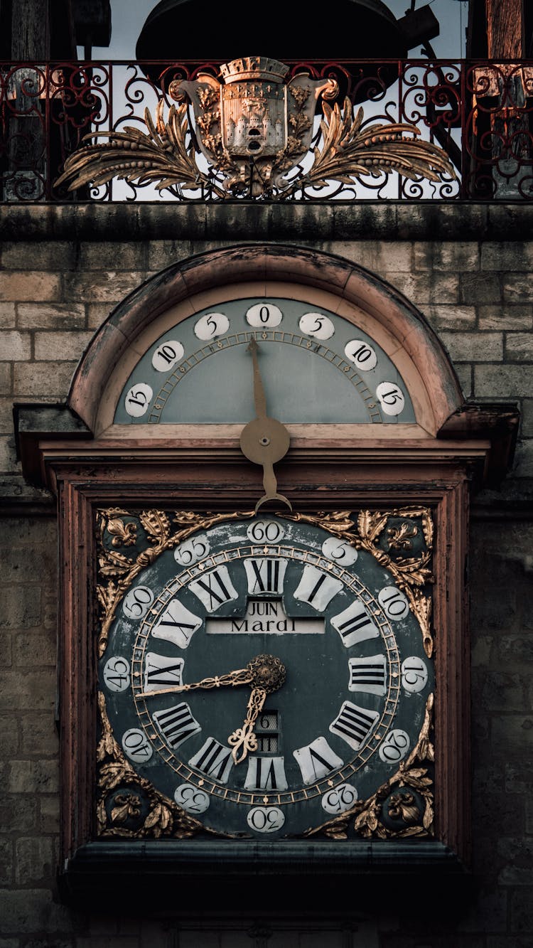 Antique Clock On A Building Facade 