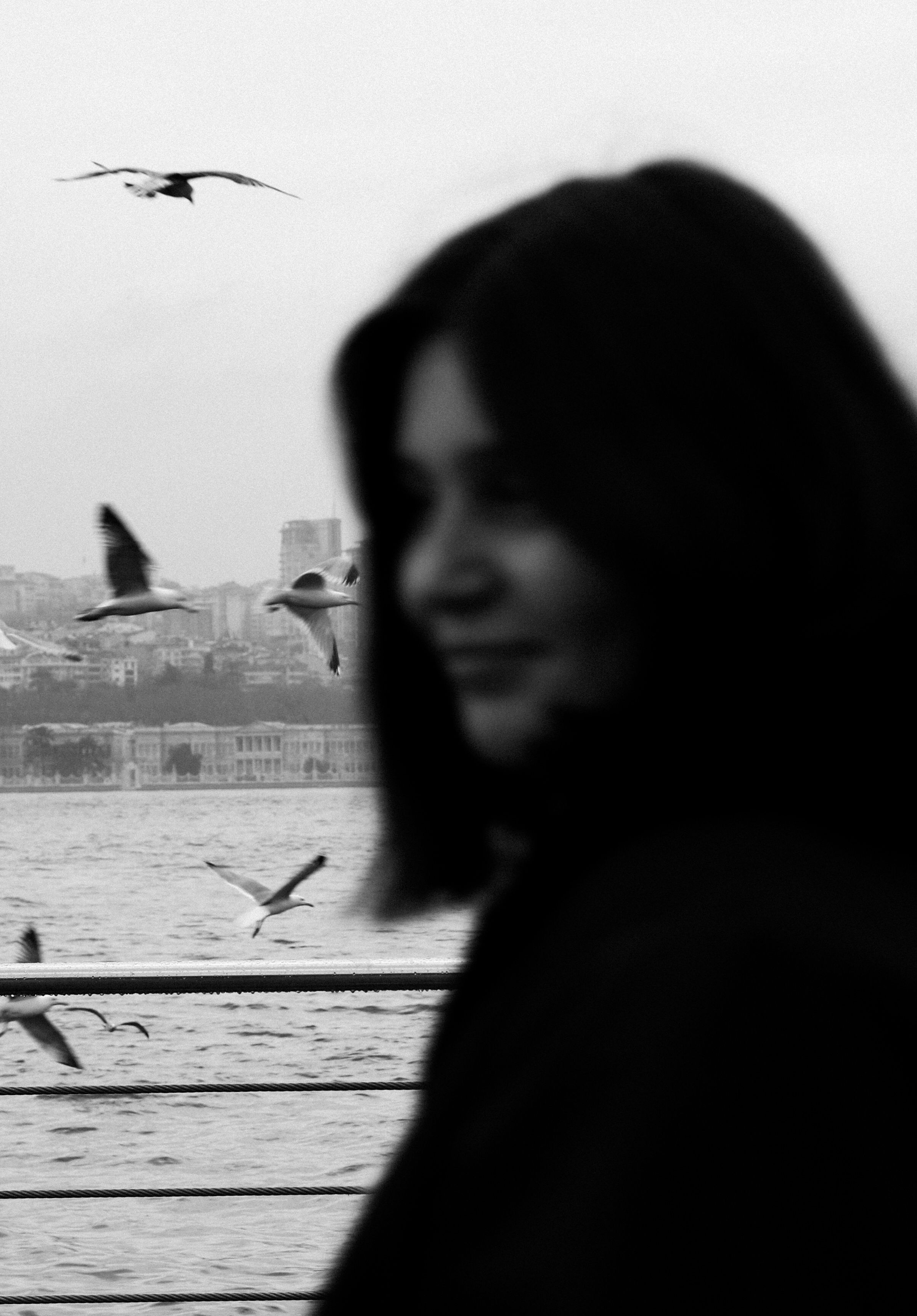 Woman and Birds Flying · Free Stock Photo
