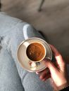 Unrecognizable Hand Holding Cup of Coffee 