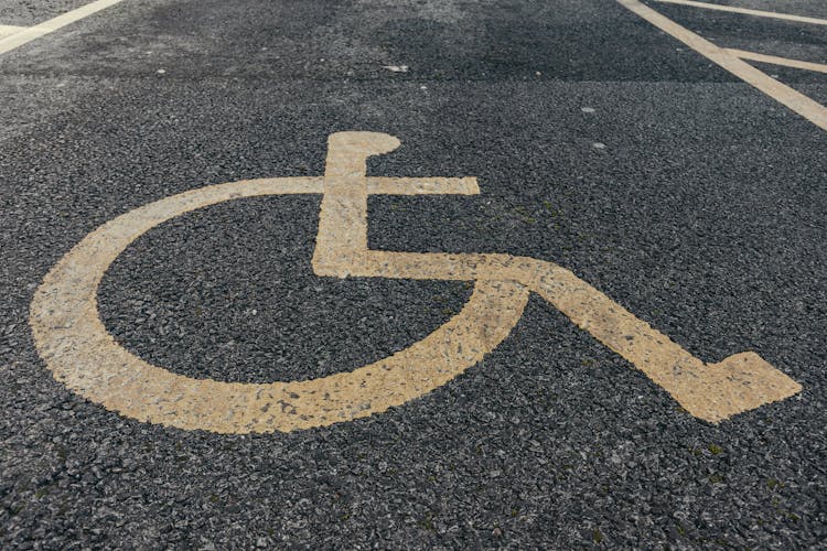 Painted Disability Icon On Pavement